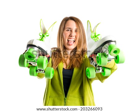 Young girl with skates over white background
