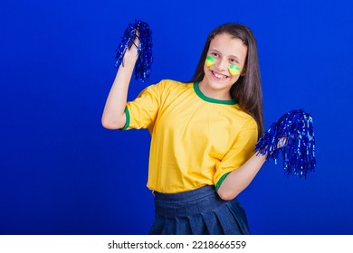 Young Girl, Soccer Fan From Brazil. Holding Cheerleader Pompom