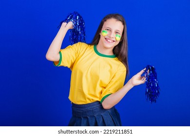 Young Girl, Soccer Fan From Brazil. Holding Cheerleader Pompom