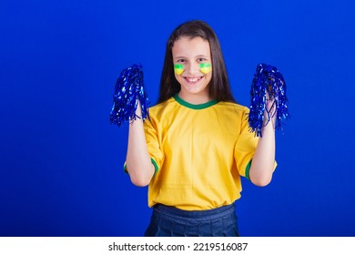 Young Girl, Soccer Fan From Brazil. Holding Cheerleader Pompom