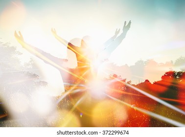 Young Girl Spreading Hands With Joy And Inspiration Facing The Sun,sun Greeting,freedom Concept