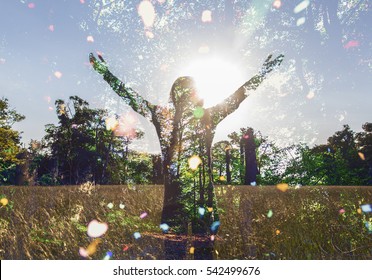 Young girl spreading hands with joy and inspiration facing the sun,sun greeting,freedom concept, nature lover ,spirit of forest  - Shutterstock ID 542499676