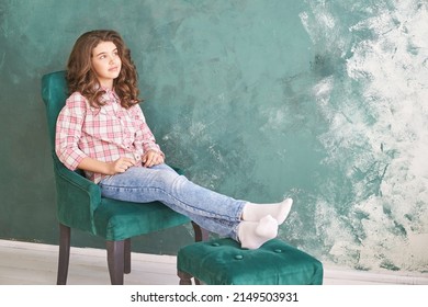 Young Girl Studio Portrait. Curly Pretty Child. Student Looking Not At Camera. Attractive Brunette. Children Emotion