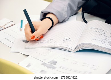 Young Girl Studying Using Pen And A Notebook, Preparation For SAT, Preparation For ACT, CLT,  Preparation For Math Exam, Standardized Test Preparation