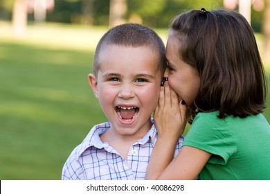 Young Girl Telling Her Brother Secret Stock Photo 40086298 | Shutterstock