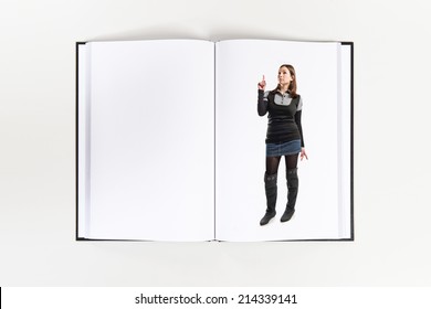 Young girl thinking printed on book - Shutterstock ID 214339141