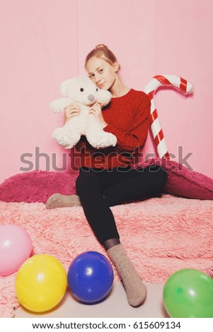 Image, Stock Photo cute girl near pink wall holding toy