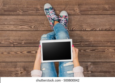 Young Girl Using White Tablet