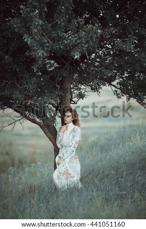 Similar – Woman posing in field of white flowers