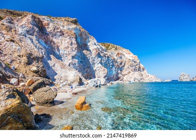 Young Girl Walking On Idyllic Beach Surrounded By Amazing Cliffs On Greek Island Of Milos