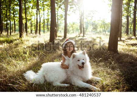 Similar – Image, Stock Photo Happy smiling dog with its pretty young owner