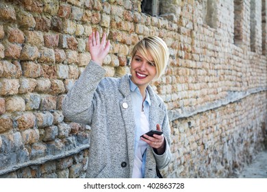 Young Girl Waving 