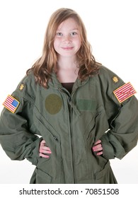 Young Girl Wearing Flight Suit Too Big For Her As Part Of Her Dream To Fly