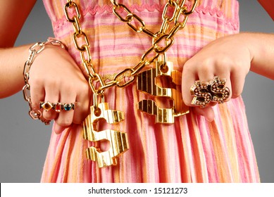 Young Girl Wearing Gaudy Hip Hop Jewelry
