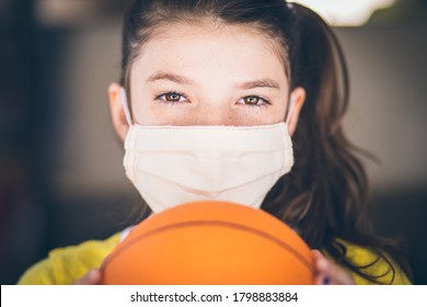 Young Girl Wearing Mask Playing Sports
