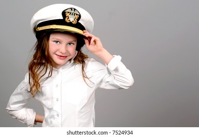 Young Girl Wearing Navy Sailor Hat