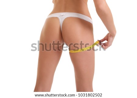 Young Girl In White Underwear Measures Her Ass Young Girl In White Underwear Measures Her Ass