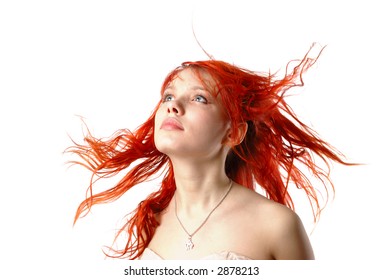 Young girl in the wind looking forward - isolated