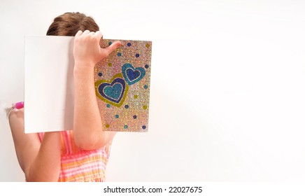 Young Girl Writing In Secret Journal