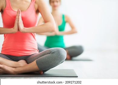 Young girls do yoga