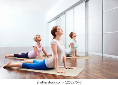 Young Girls Do Yoga Indoors