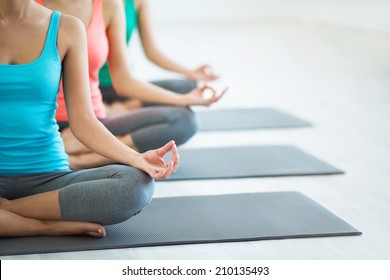 Young Girls Do Yoga Indoors