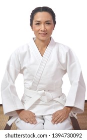 Young Girls Judo Fighters Isolated In White Kimono