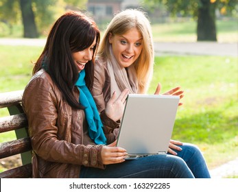 Young Girls Are Very Surprised Because Of Something They Saw On Their Laptop,Using Laptop