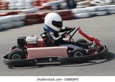 Young Go Cart Race On Circuit