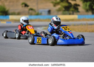 Young Go Cart Racer On Circuit