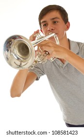 young good looking boy playing the trumpet