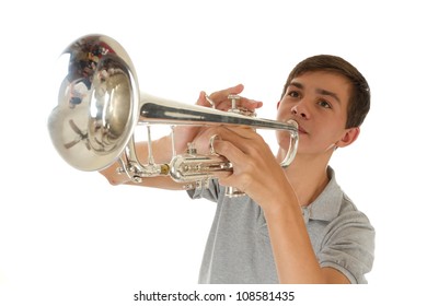 young good looking boy playing the trumpet
