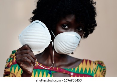 Young And Gorgeous African Woman Nurse Doctor Wearing A Face Mask Prevention From Virus Outbreak