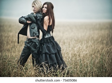 Young Goth Couple Outdoors Portrait.