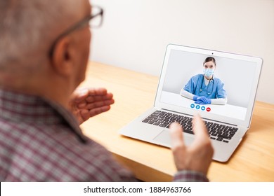 Young GP Physician And Elderly Male Patient Consulting Over Video Call,virtual Medical Health Check-up,doctor Tele Visit Instead Of In-office Appointment During COVID-19 Pandemic Outbreak Lockdown