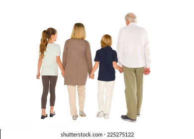 Young Grandmother Grandfather With Nephew And Niece Standing Back On White Background