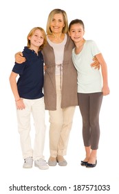 Young Grandmother With Nephew And Niece Standing On White Background