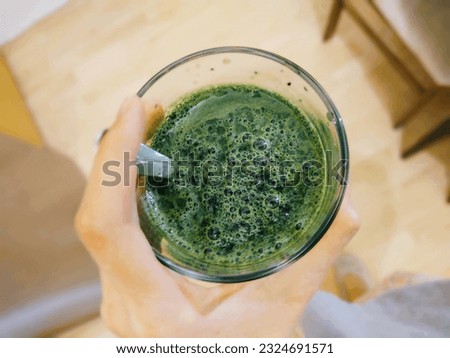 Young green barley or chlorella green food in the cup or bowl. Slovakia