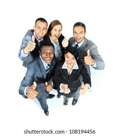 Young Group Of Business People Showing Thumbs Up Signs In Joy