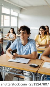 Young group of high school students paying attention to teacher in classroom. Education lifestyle concept.