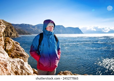 young guy admires the view of the sea