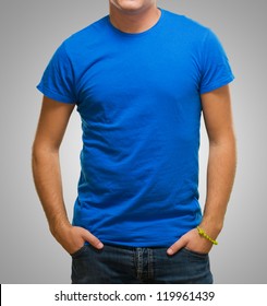 Young Guy With Blue Shirt On Grey Background