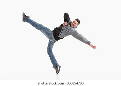 Young Guy Is Dancing. Street Dance. White Background.