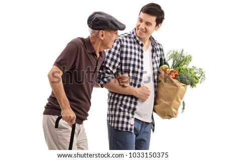 Young guy helping an elderly man with his groceries isolated on white background