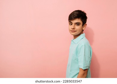Young guy looking at camera in studio.