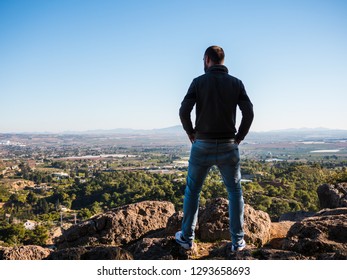 young guy looking at landscape
