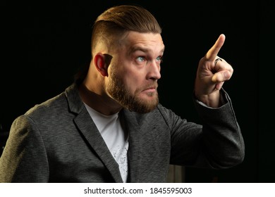 The young guy presses or points to the push button. selective focus