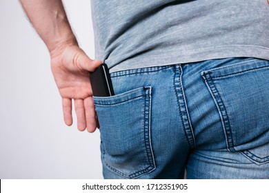 Young Guy Puts His Mobile Phone Stock Photo 1712351905 | Shutterstock