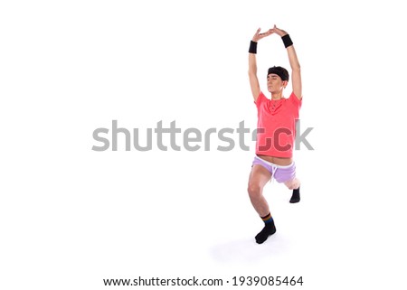 A young guy in shorts and a T-shirt goes in for sports and fitness. Retro style. 80s, 90s, 70s. Isolate. White background.