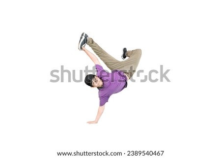 Young guy wearing hat doing some break dancing isolated on white background